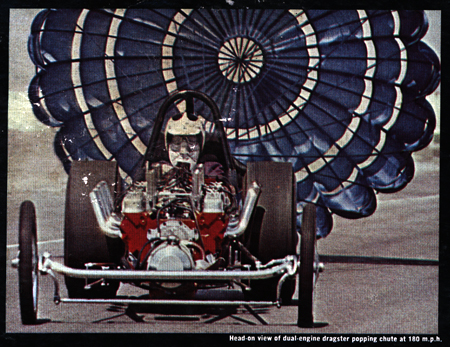 Head-on view of dual-engine dragster popping chute at 180 m.p.h. - Back cover album photo from the T-Bones : Boss Drag LP